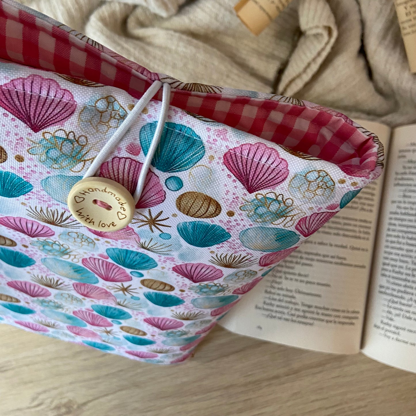 Funda literaria conchas marinas impermeable