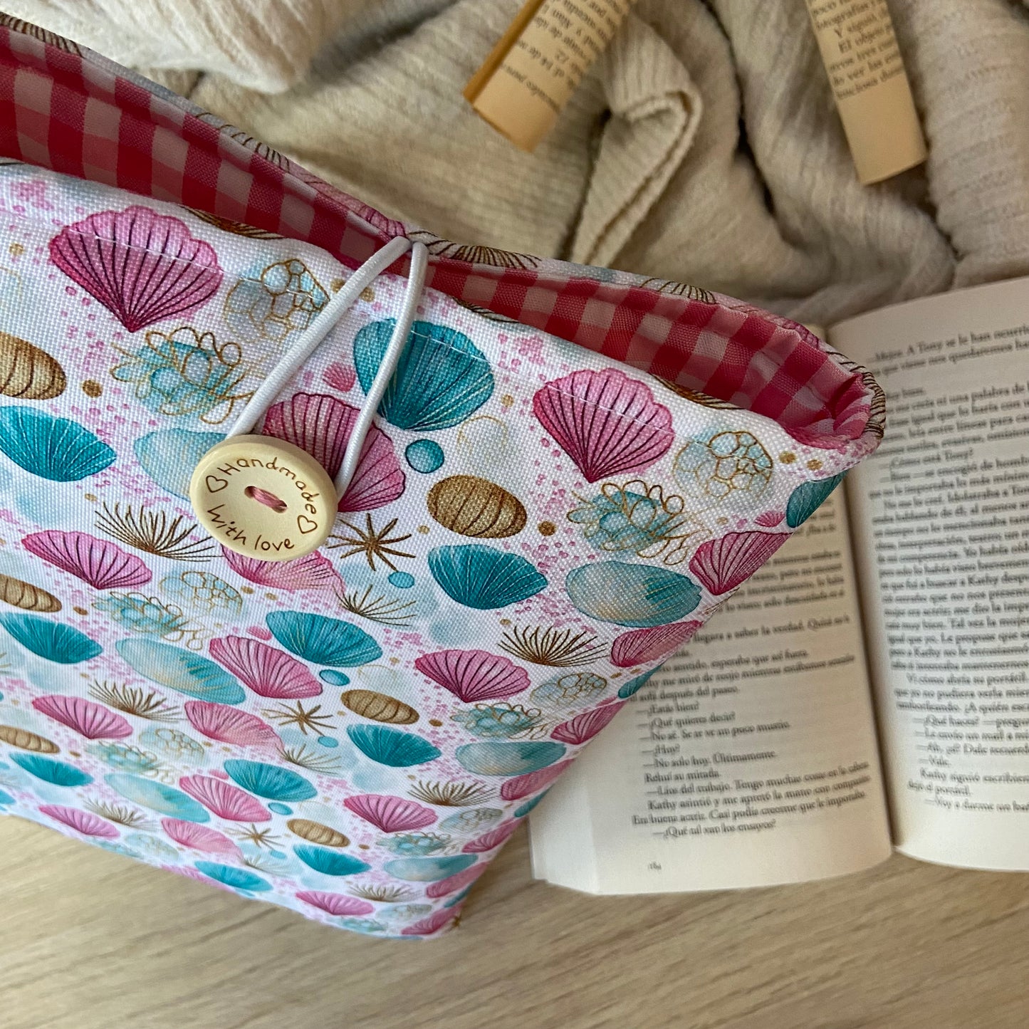 Funda literaria conchas marinas impermeable