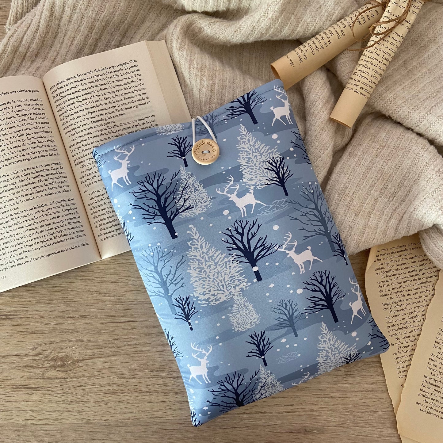 Funda literaria renos en el bosque