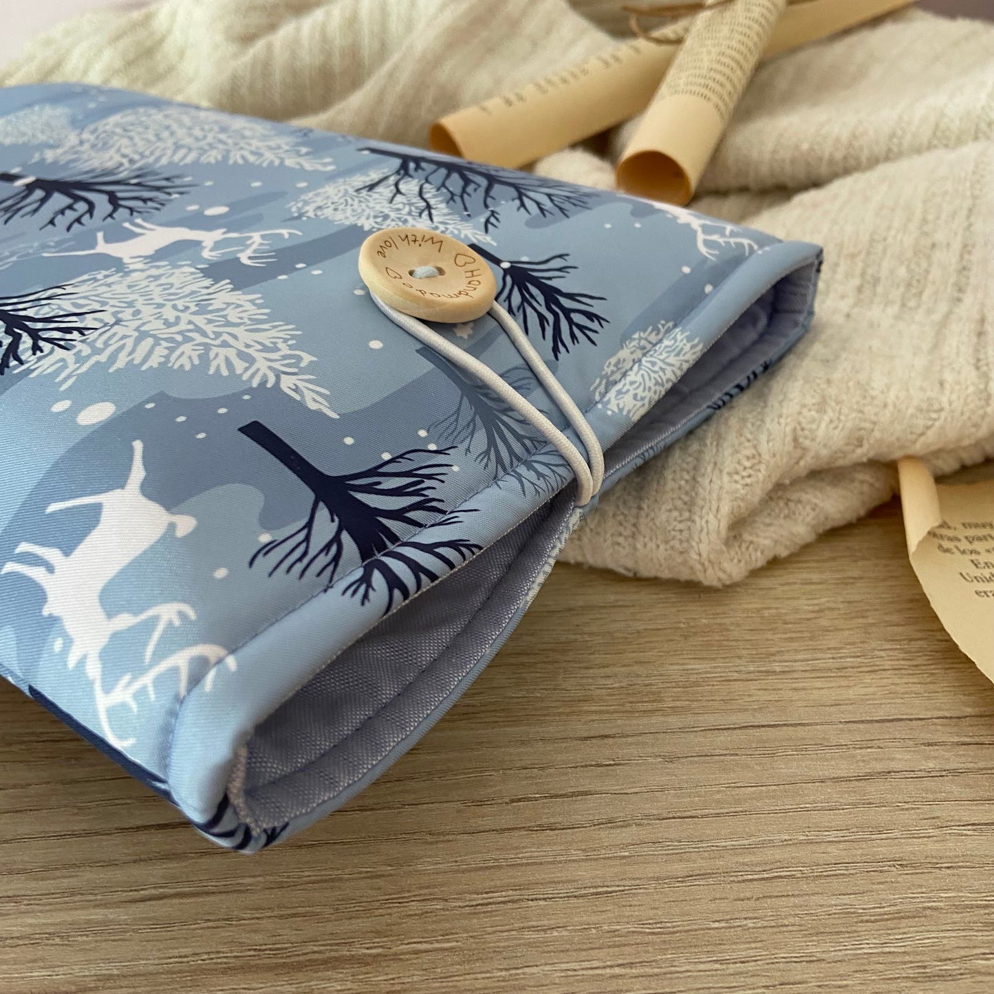 Funda literaria renos en el bosque