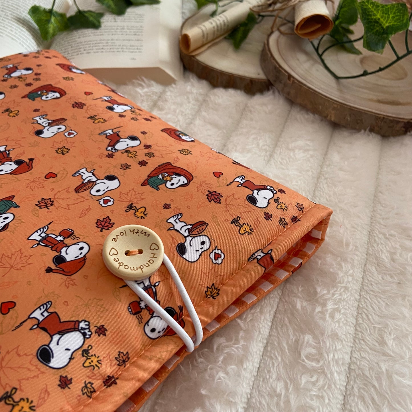 Funda literaria Snoopy en otoño