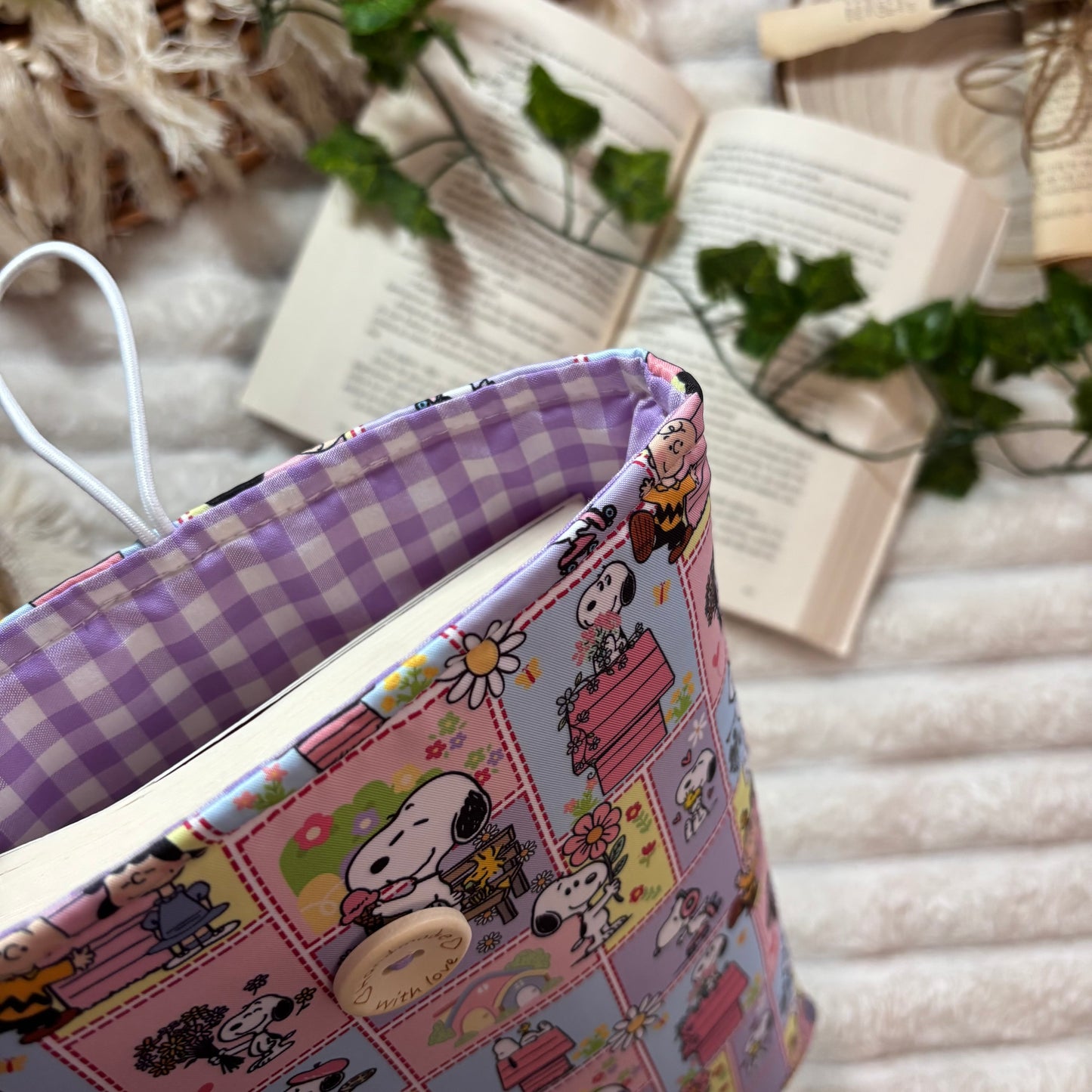 Funda literaria Snoopy en la vida