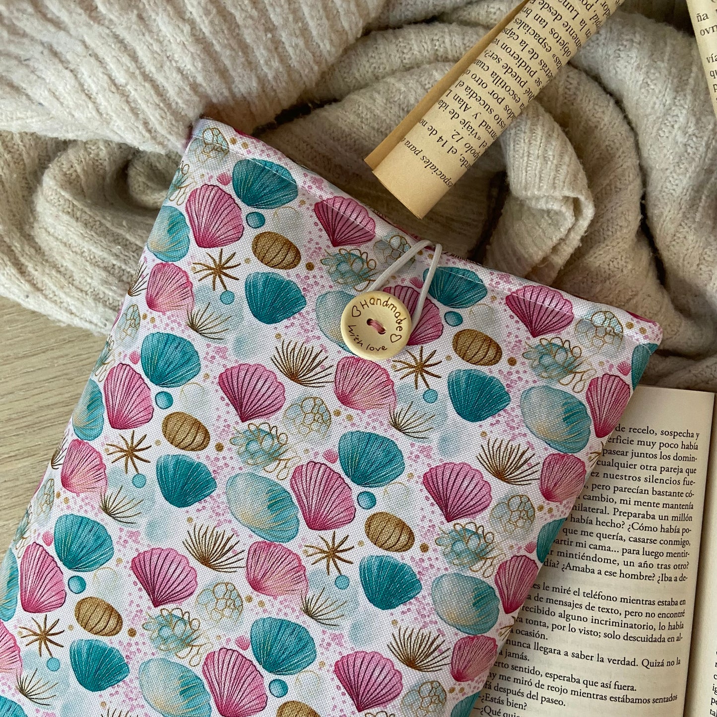Funda literaria conchas marinas impermeable