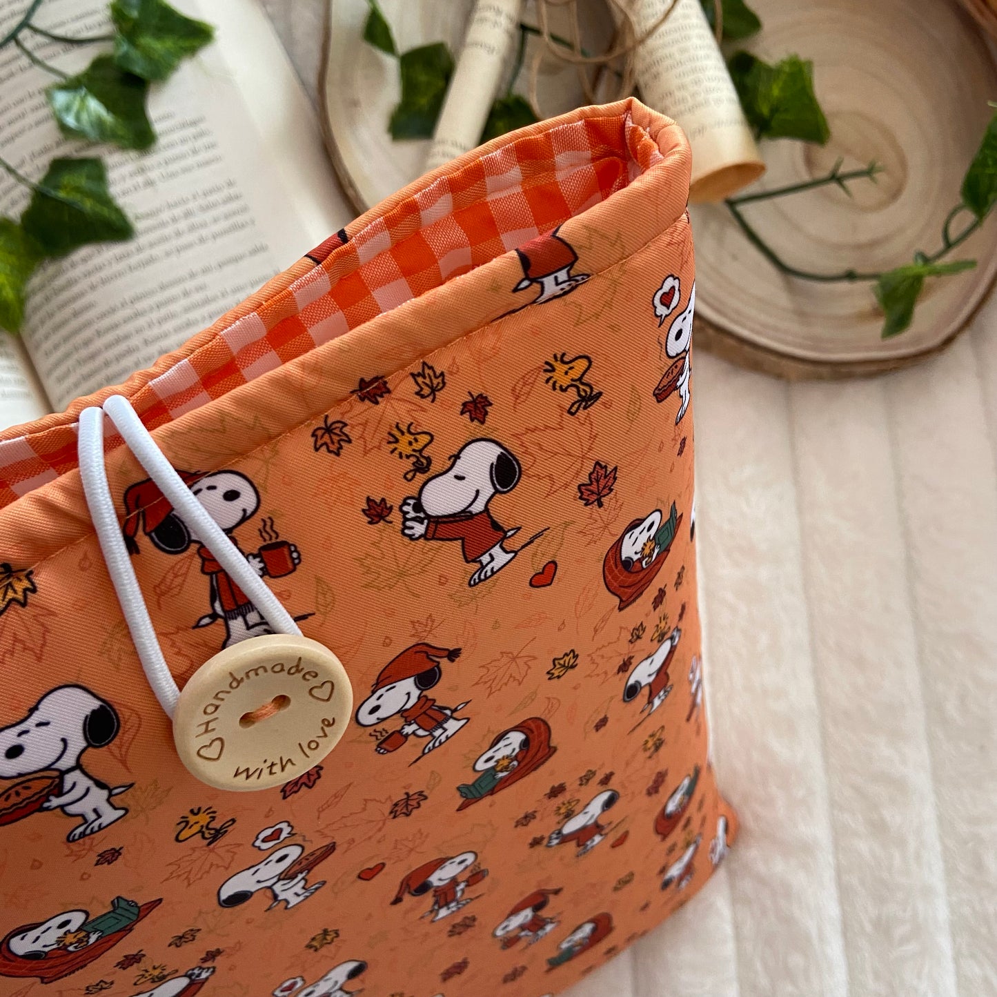 Funda literaria Snoopy en otoño