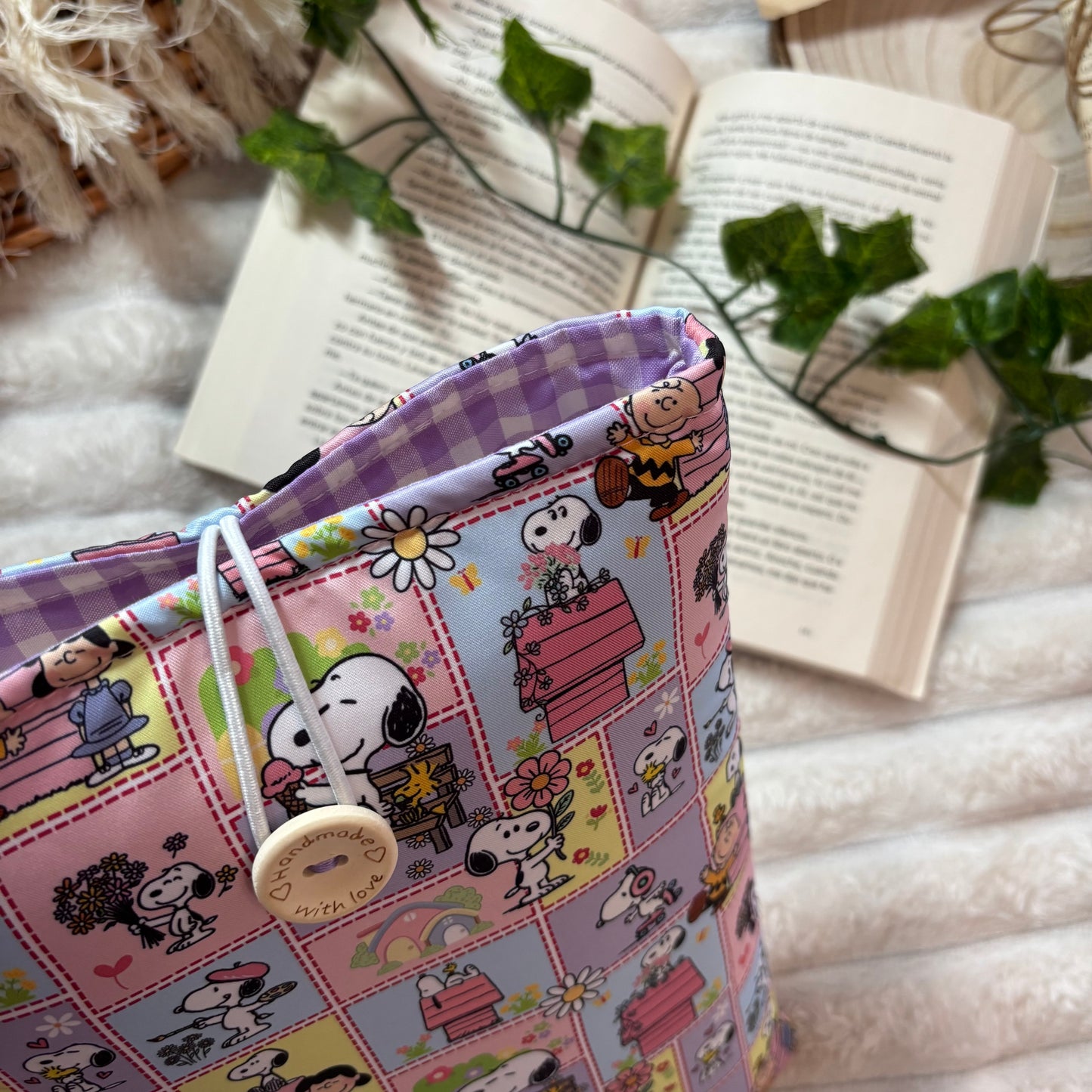 Funda literaria Snoopy en la vida