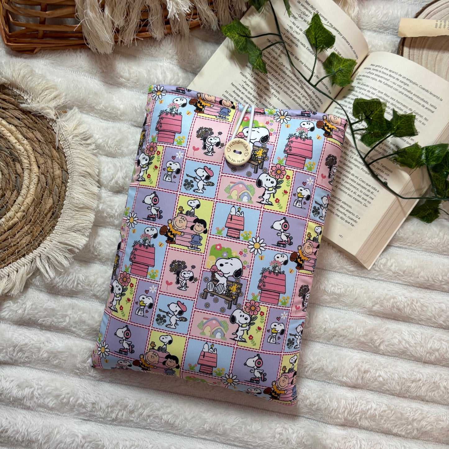 Funda literaria Snoopy en la vida