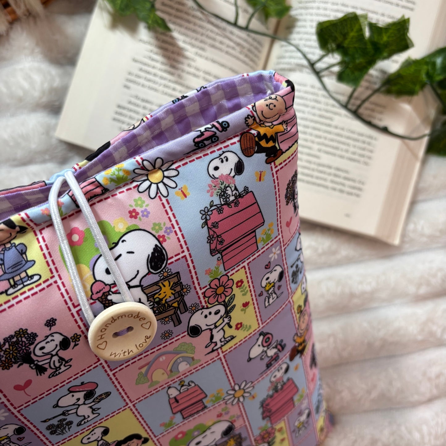Funda literaria Snoopy en la vida