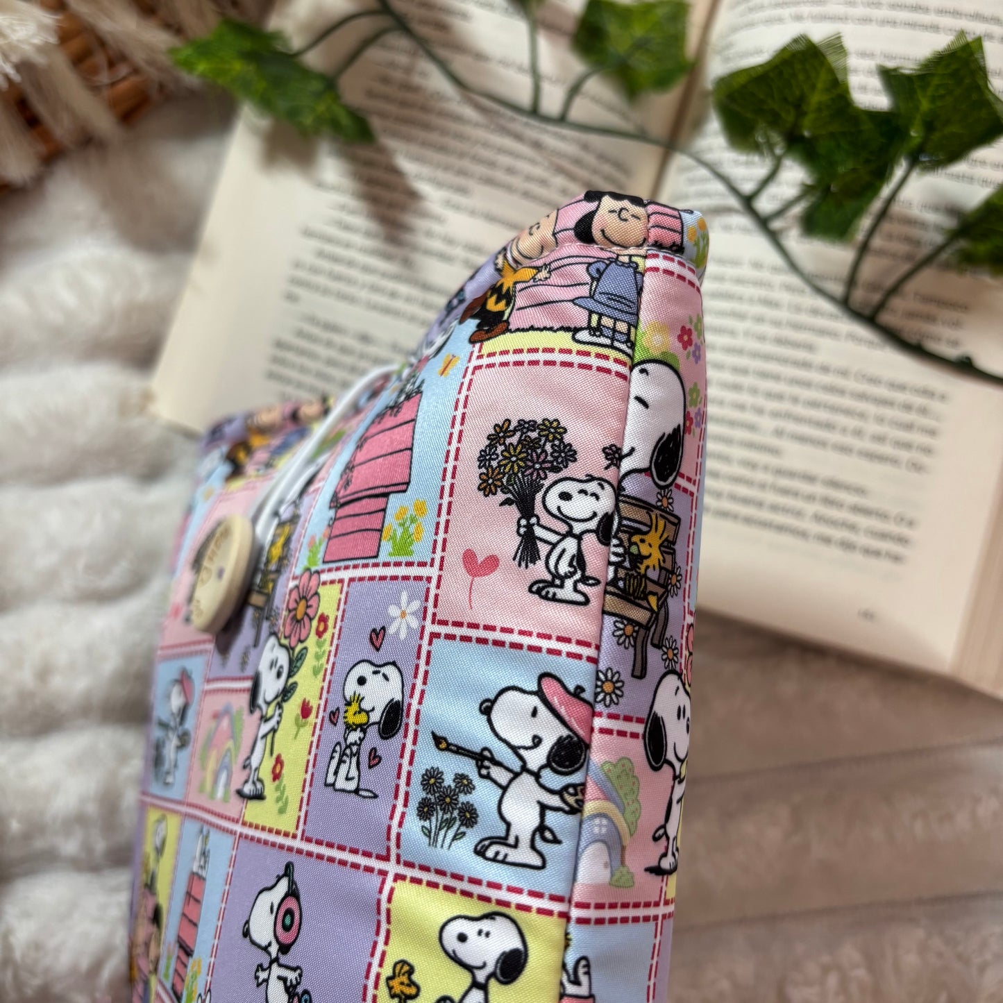 Funda literaria Snoopy en la vida