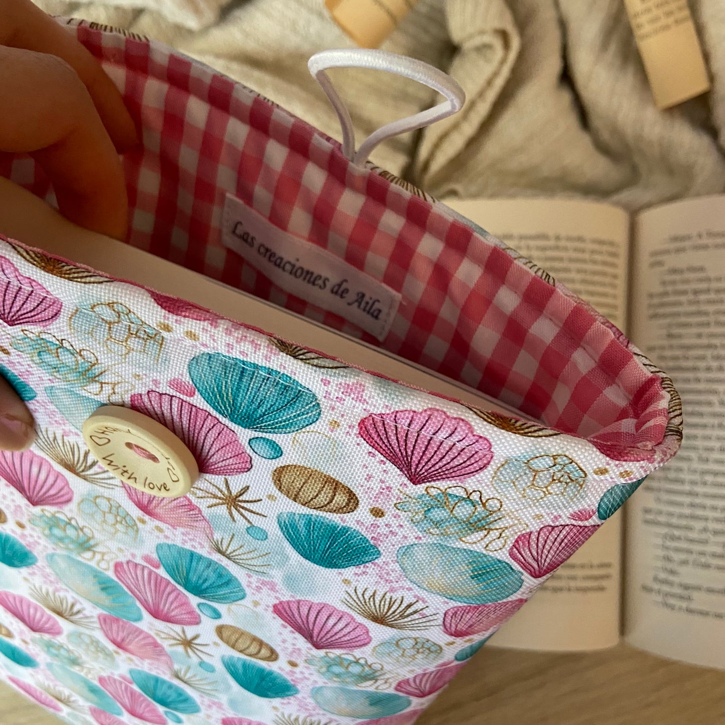 Funda literaria conchas marinas impermeable