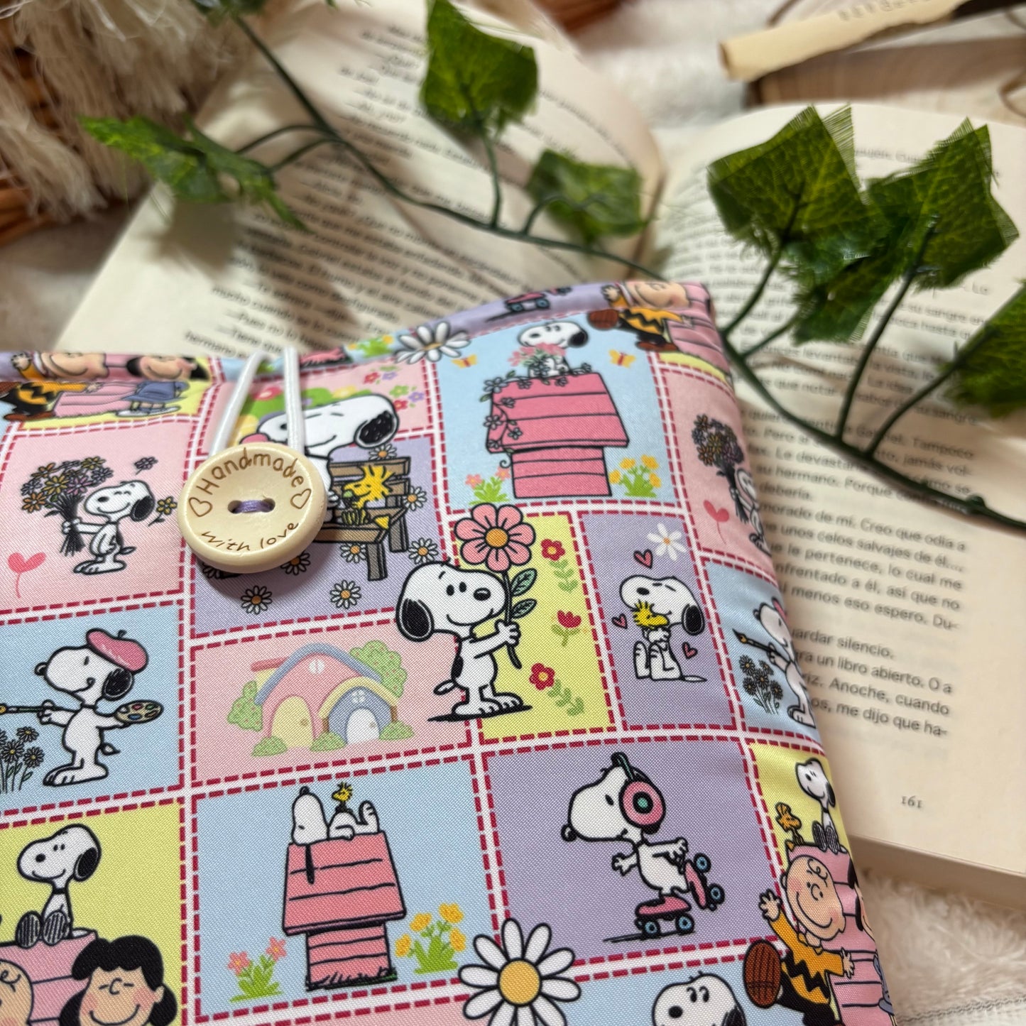 Funda literaria Snoopy en la vida