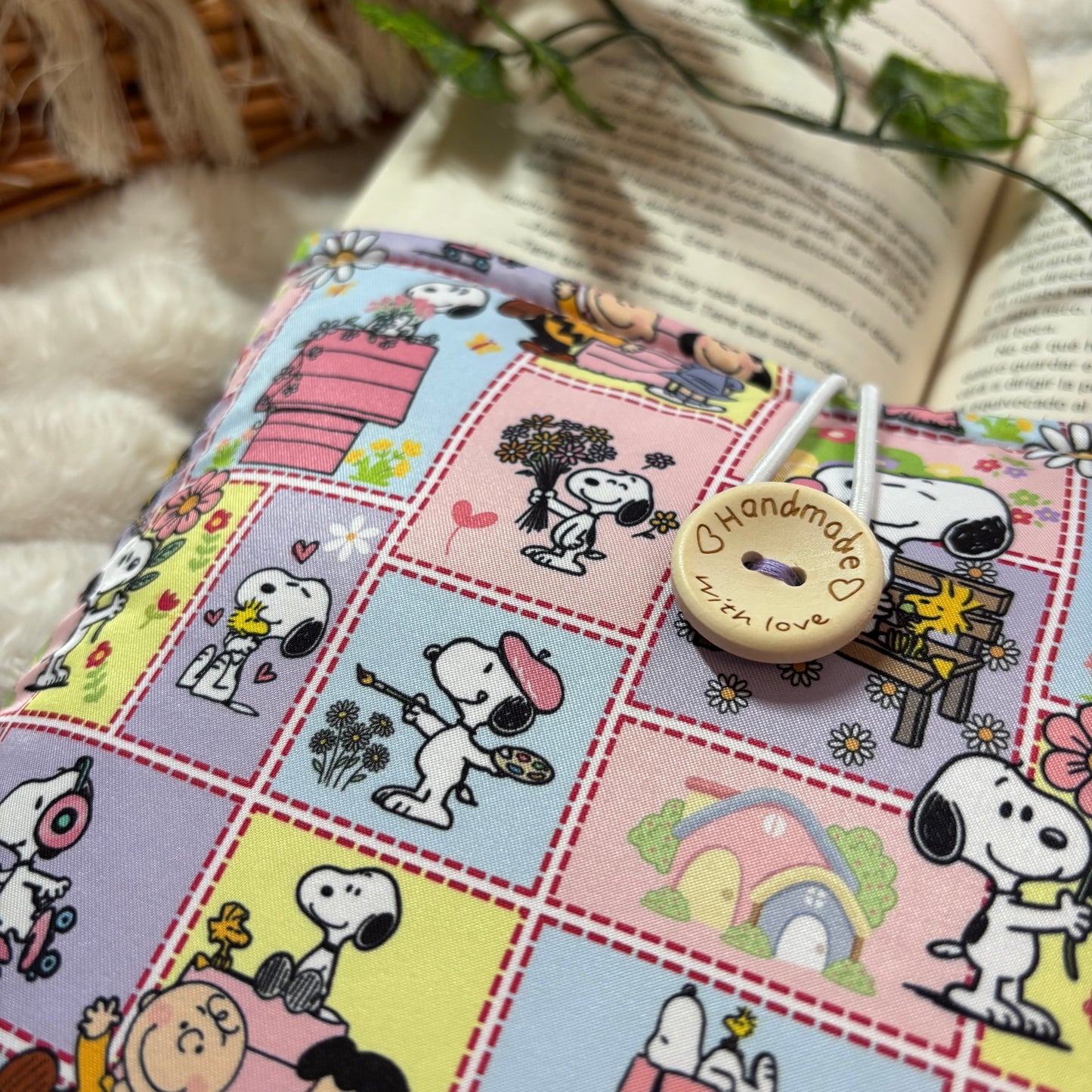 Funda literaria Snoopy en la vida