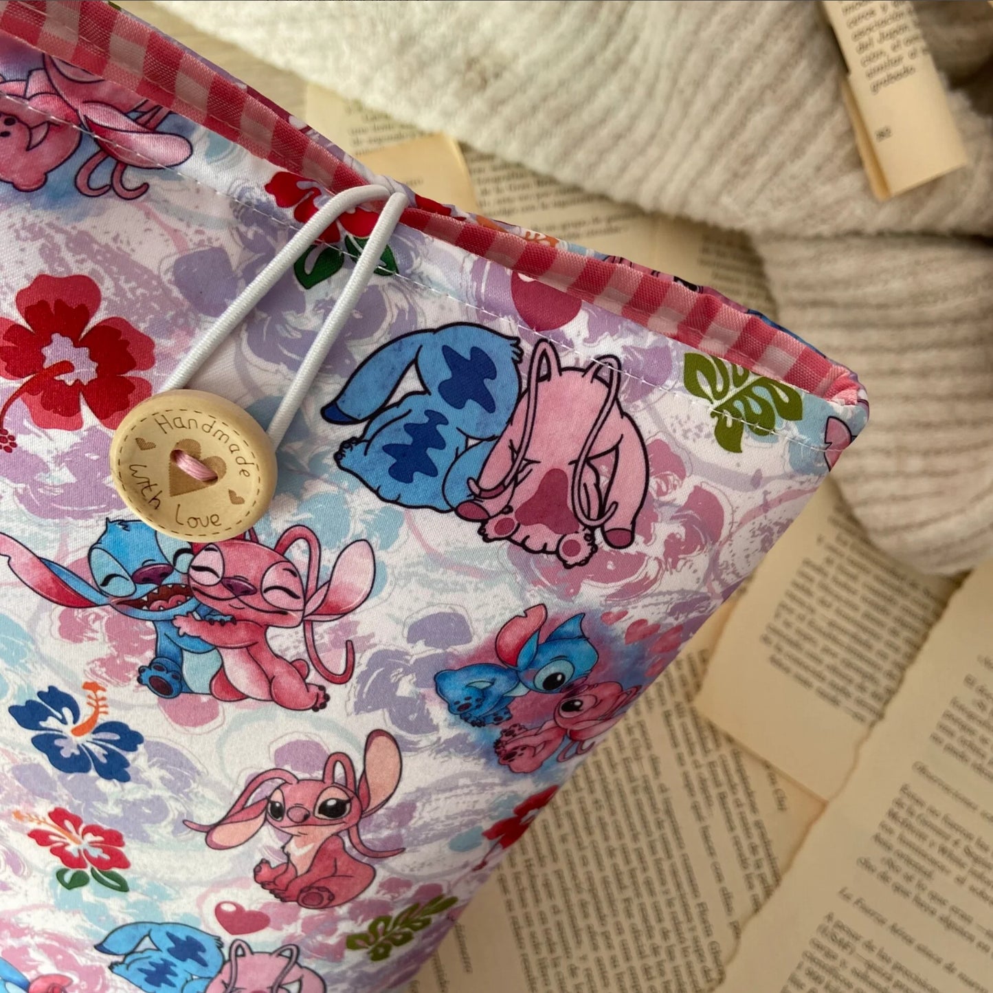 Funda literaria Stitch y Angel