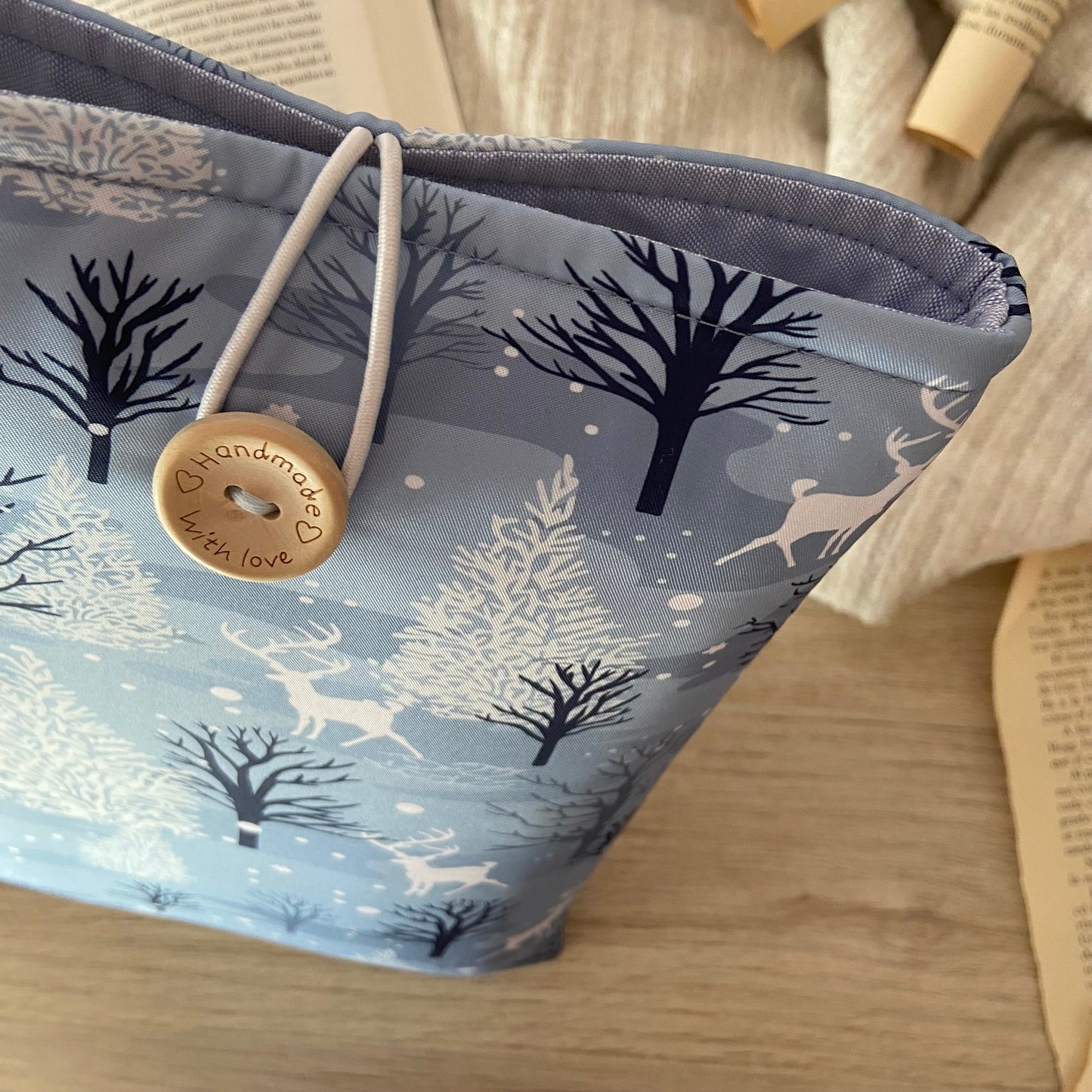 Funda literaria renos en el bosque