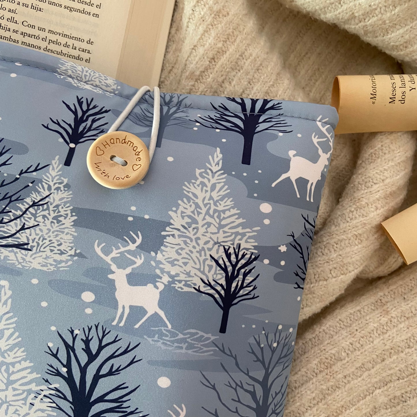 Funda literaria renos en el bosque